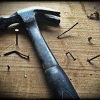 hammer and bent nails hammer and bent nails